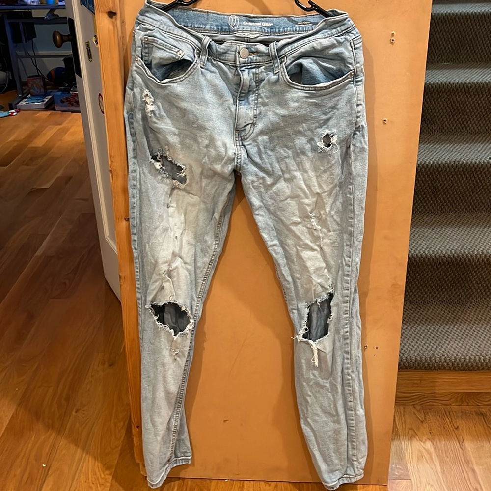 Light blue worn slim taper jeans